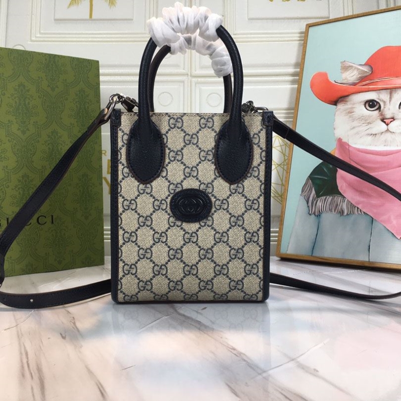 G*u*i top handle bags